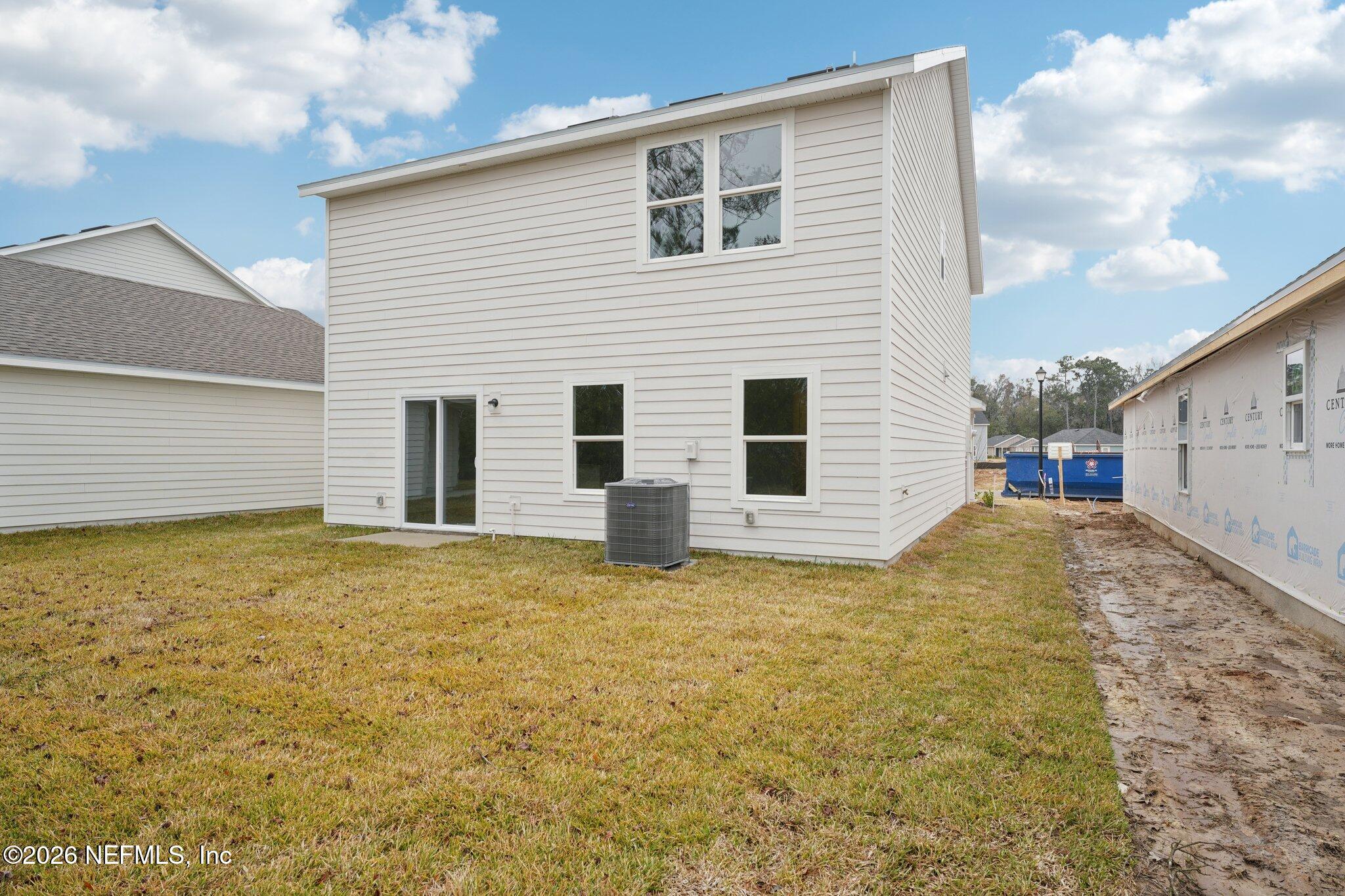 3547 Mildred Way Jacksonville, FL 32254 - Photo 7 of 13 a view of a house with a backyard