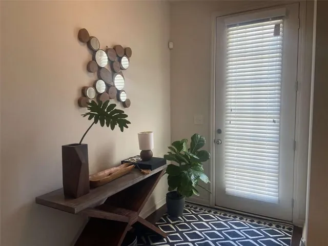 a vase of flowers sitting on a table