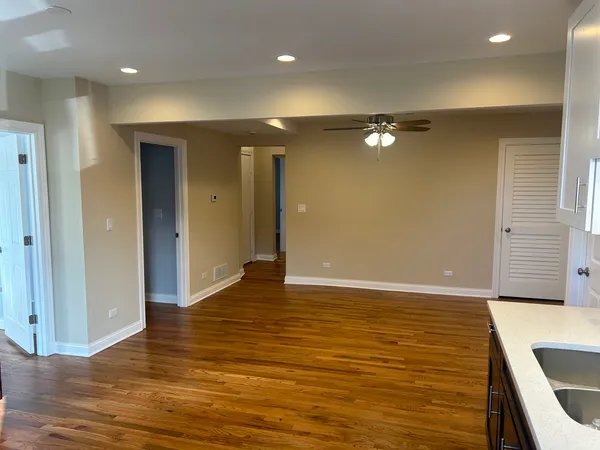 a view of a livingroom with wooden floor