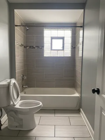 a kitchen with a white stove top oven and sink