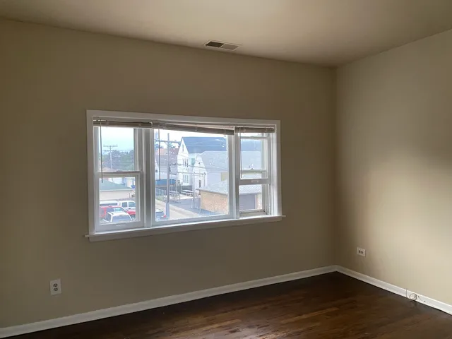 a kitchen with a sink a microwave a stove and refrigerator