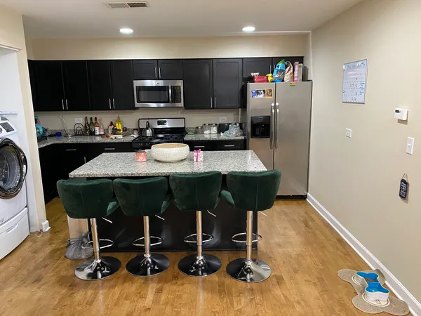 a bed room with a bed and a couch