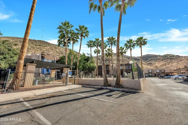 a view of a building with a street