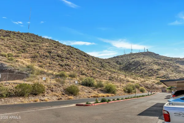 a view of a road with an ocean view