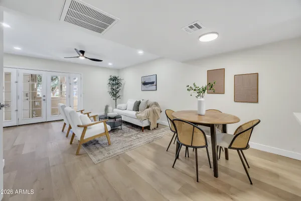 a view of a livingroom with furniture and wooden floor