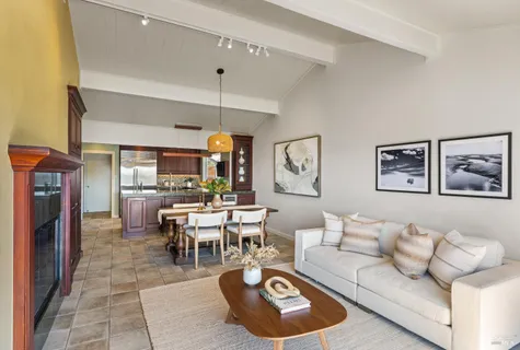 a dining room with a table and chairs