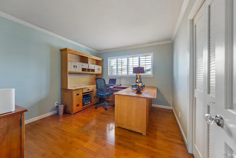 a bathroom with a tub and shower