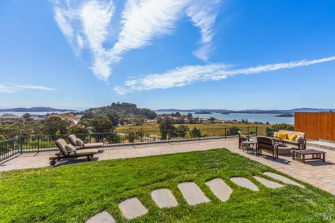a view of a garden with an outdoor space