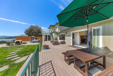 a front view of a residential apartment building with a yard