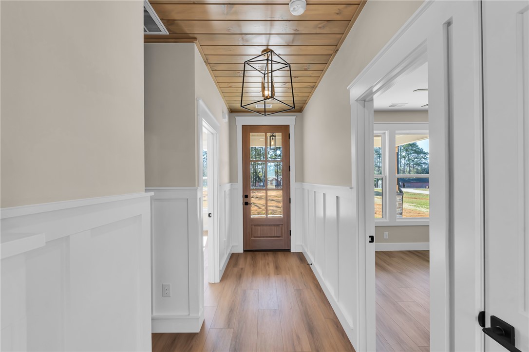 4546 Flat Rock Road Iva, SC 29655 - Photo 16 of 28 Step into this inviting entryway featuring a warm wooden ceiling and durable flooring.