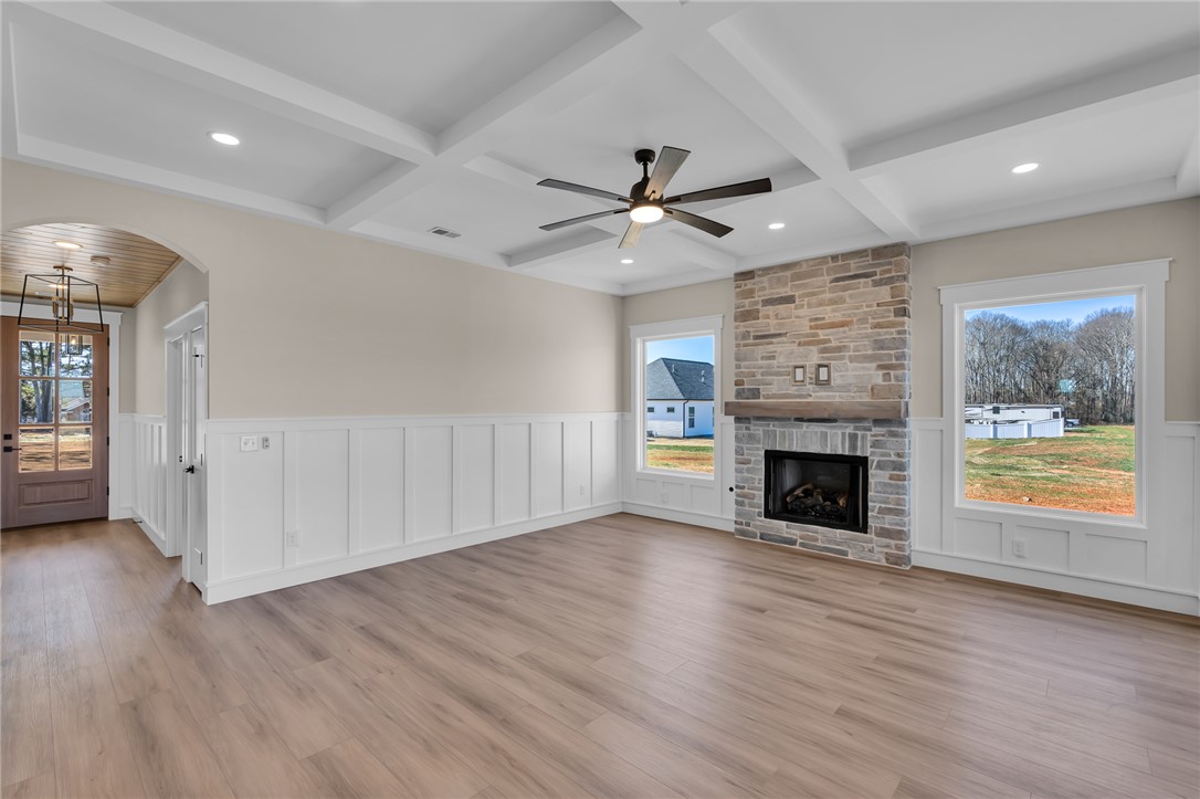 4546 Flat Rock Road Iva, SC 29655 - Photo 9 of 28 This expansive living area features striking architectural details and a warm, inviting ambiance.