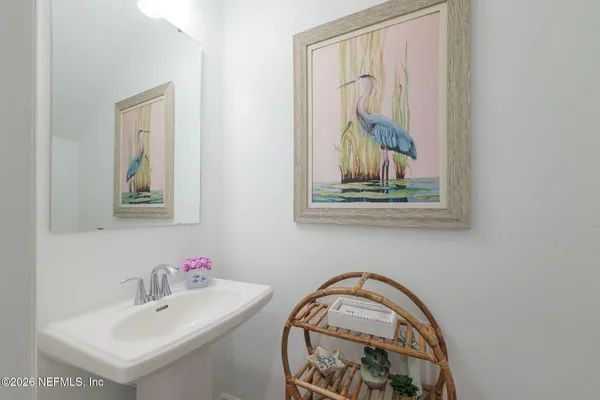 a bathroom with a stove and a sink