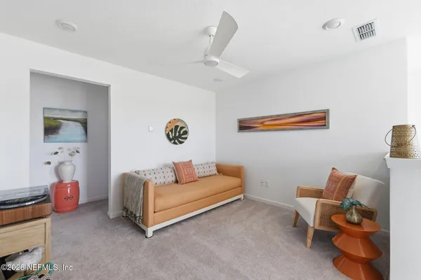 a bedroom with furniture and a couch