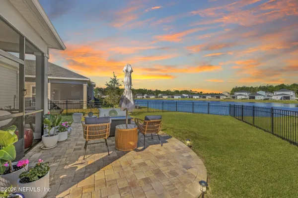 a view of a terrace with furniture