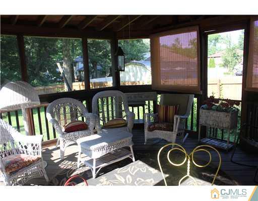 972 New Dover Road Edison, NJ 08820 - Photo 12 of 20 a view of a chairs and table in the patio