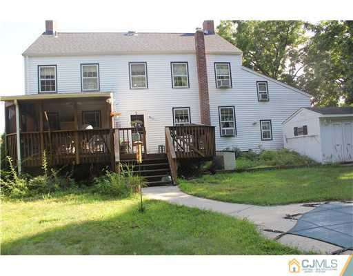 972 New Dover Road Edison, NJ 08820 - Photo 20 of 20 a view of house with backyard