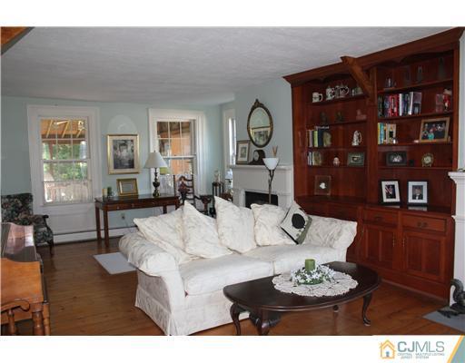972 New Dover Road Edison, NJ 08820 - Photo 3 of 20 a living room with furniture and window