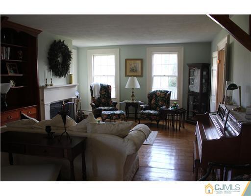 972 New Dover Road Edison, NJ 08820 - Photo 4 of 20 a living room with furniture and a window