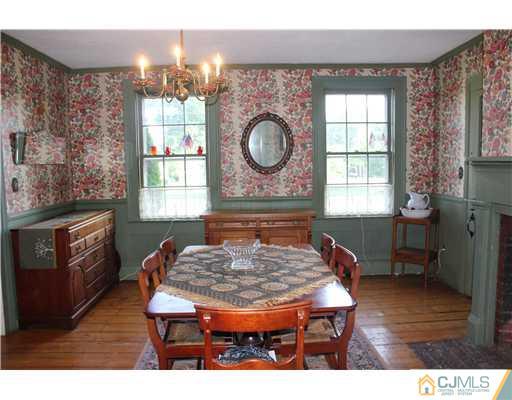 972 New Dover Road Edison, NJ 08820 - Photo 5 of 20 a living room with furniture a window and wooden floor