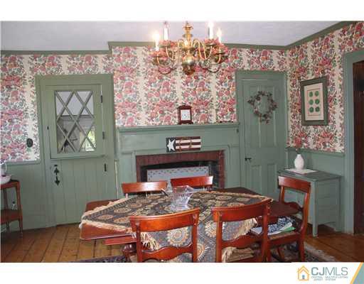 972 New Dover Road Edison, NJ 08820 - Photo 6 of 20 a bedroom with a bed and a painting on the wall