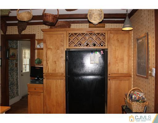 972 New Dover Road Edison, NJ 08820 - Photo 10 of 20 a close view of a refrigerator in a kitchen