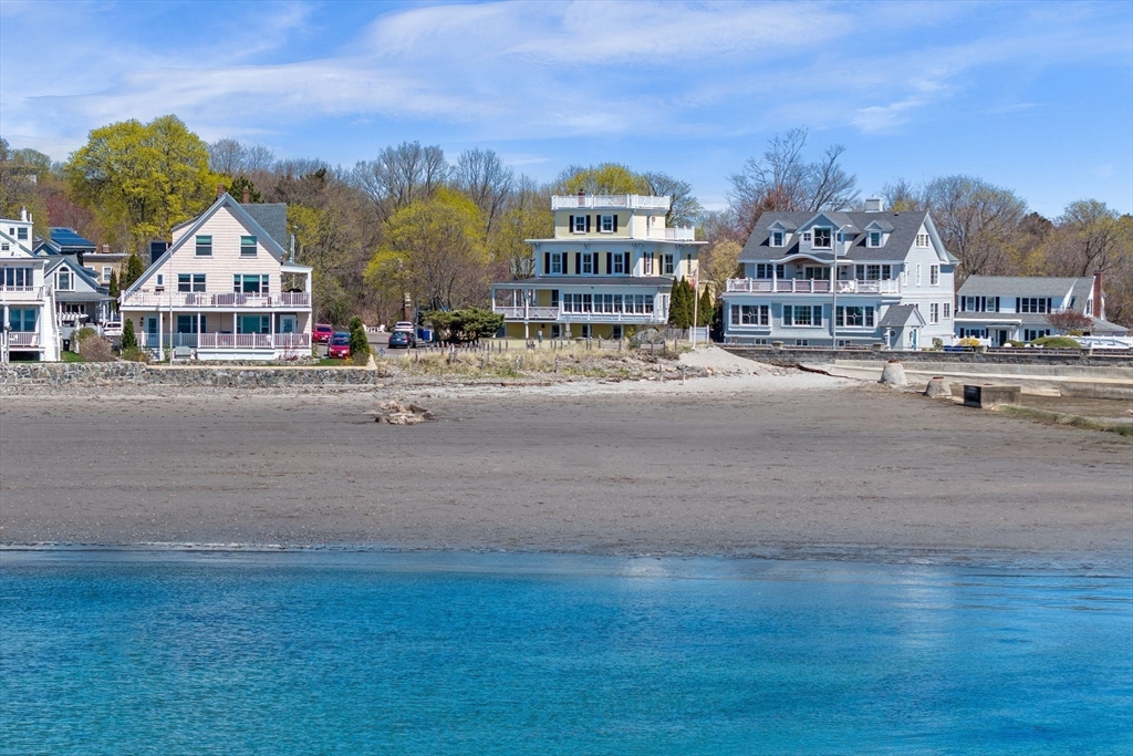 90 Puritan Road Swampscott, MA 01907 - Photo 7 of 42 a view of multiple houses with a street