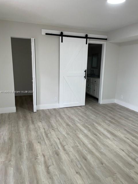 7753 Courtyard Run West, Unit 7753 Boca Raton, FL 33433 - Photo 9 of 15 a view of an empty room