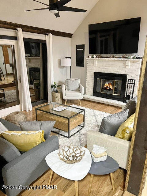 370 Coach Road Tobyhanna, PA 18466 - Photo 5 of 23 a living room with furniture a flat screen tv and a fireplace