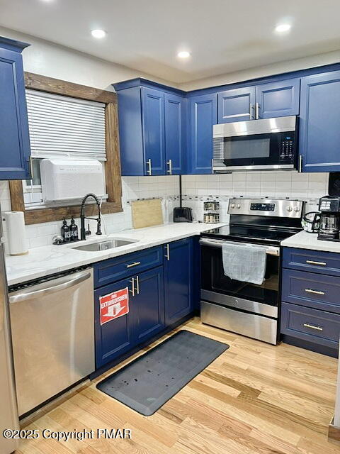 370 Coach Road Tobyhanna, PA 18466 - Photo 6 of 23 a kitchen with stainless steel appliances granite countertop a sink stove and microwave