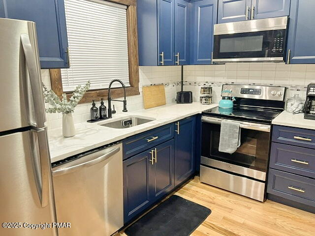 370 Coach Road Tobyhanna, PA 18466 - Photo 7 of 23 a kitchen with stainless steel appliances granite countertop a sink stove and refrigerator