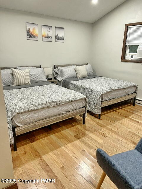 370 Coach Road Tobyhanna, PA 18466 - Photo 10 of 23 a bedroom with a bed and painting on the wall