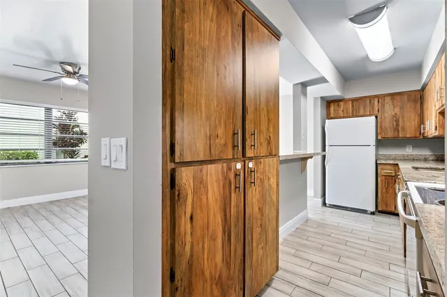 a view of a kitchen from the hallway