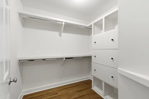 a view of an empty walk in closet