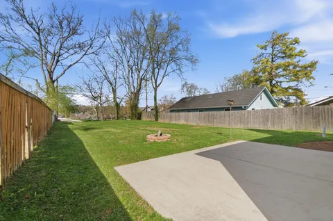a view of a backyard with green space