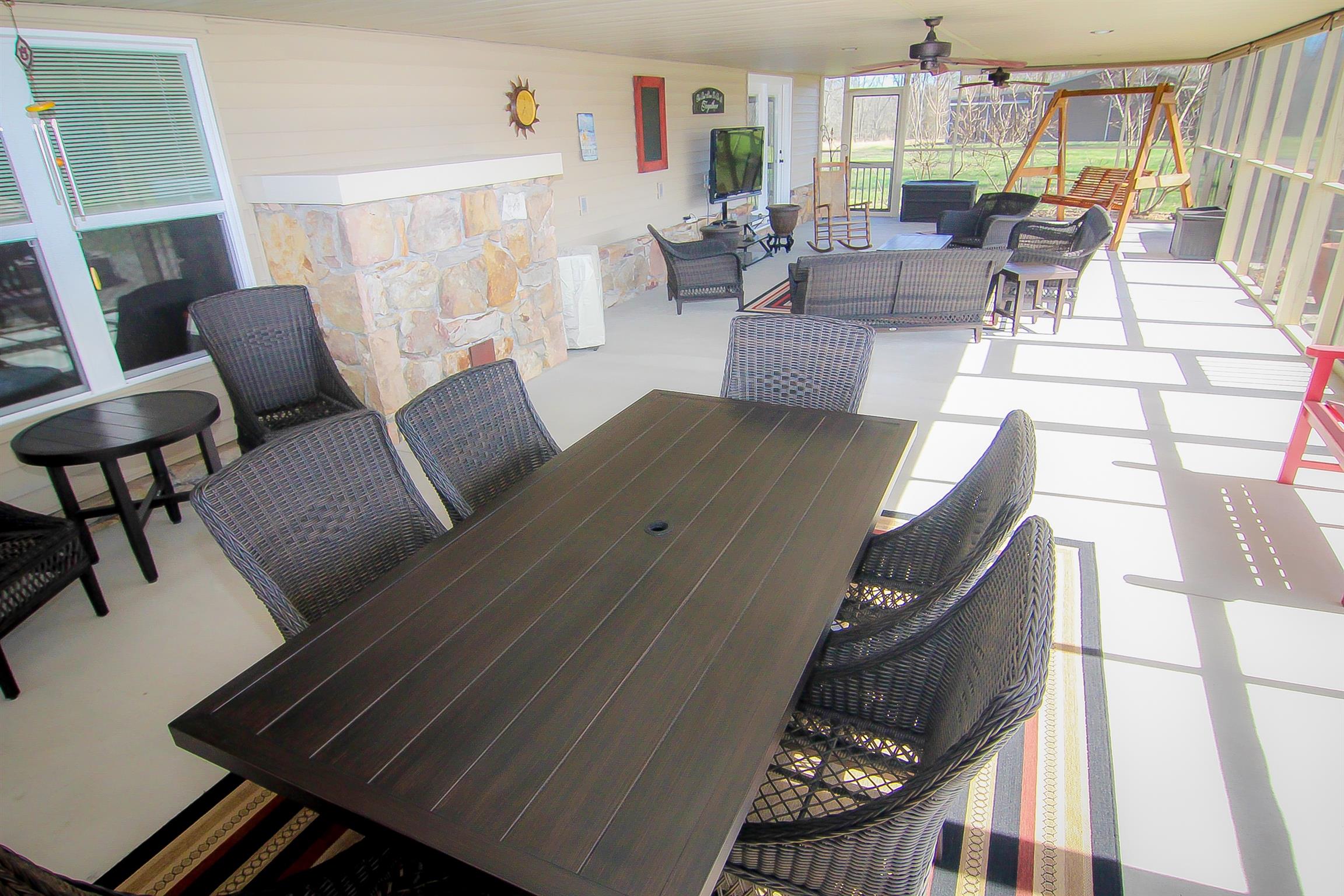 A very large screen in porch with pull down shades