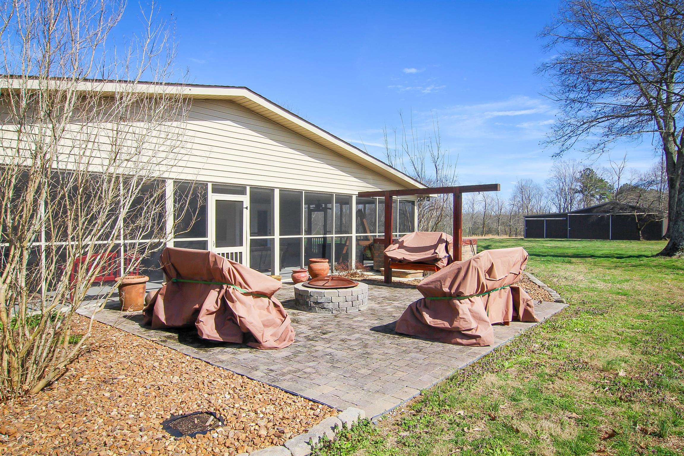 3989 Spring Creek Road Estill Springs, TN 37330 - Photo 10 of 28 Enjoy the patio with fire pit and hot tub