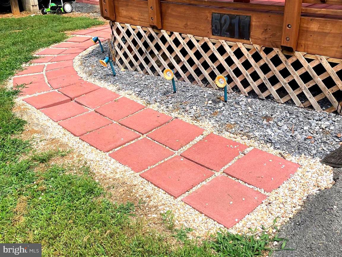 52 Block Butterfly Boulevard Falling Waters, WV 25419 - Photo 16 of 23 a view of a backyard