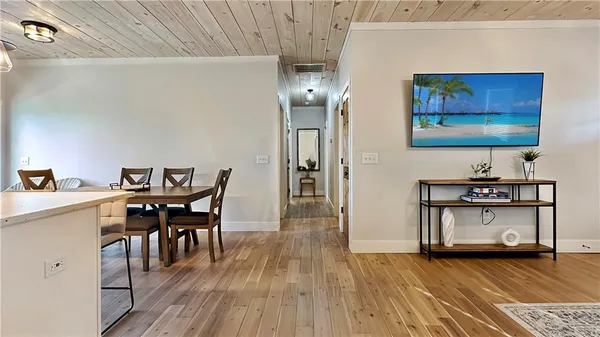 a view of a livingroom with furniture and wooden floor