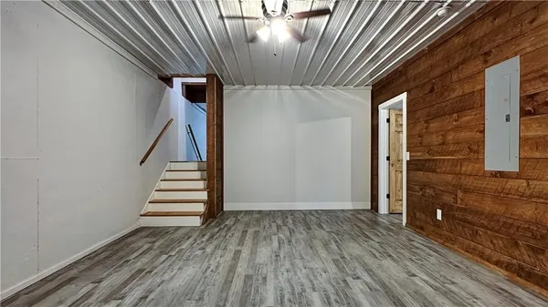a view of entryway with wooden floor