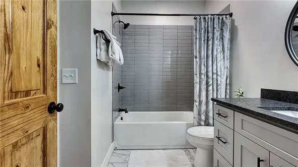 a bedroom with a bed and a closet