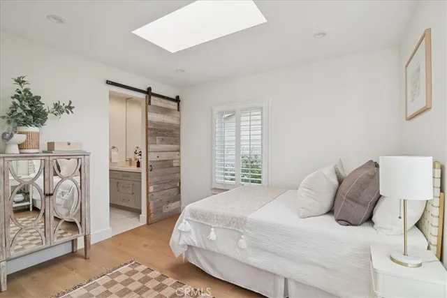 a view of balcony with wooden floor and fence