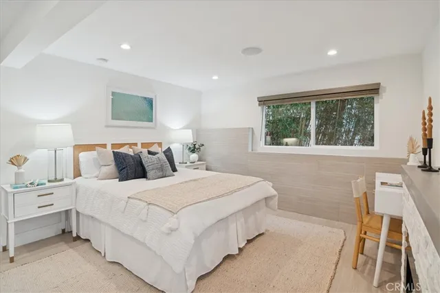 a view of a house with a small backyard