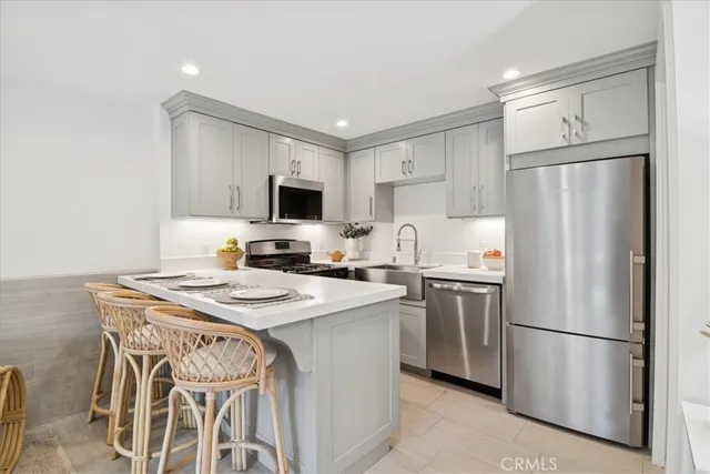 a view of a yard with wooden fence