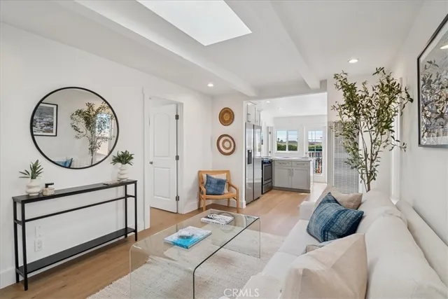 a kitchen with stainless steel appliances granite countertop a refrigerator stove and sink