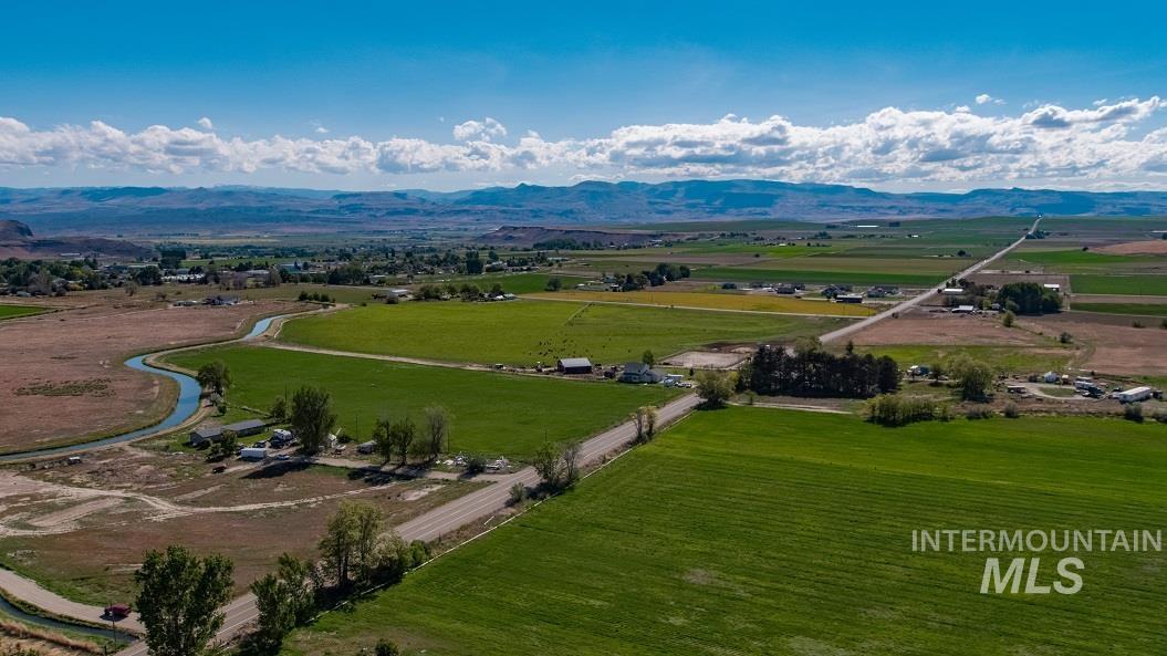 Overview of rural landscape featuring mountains
