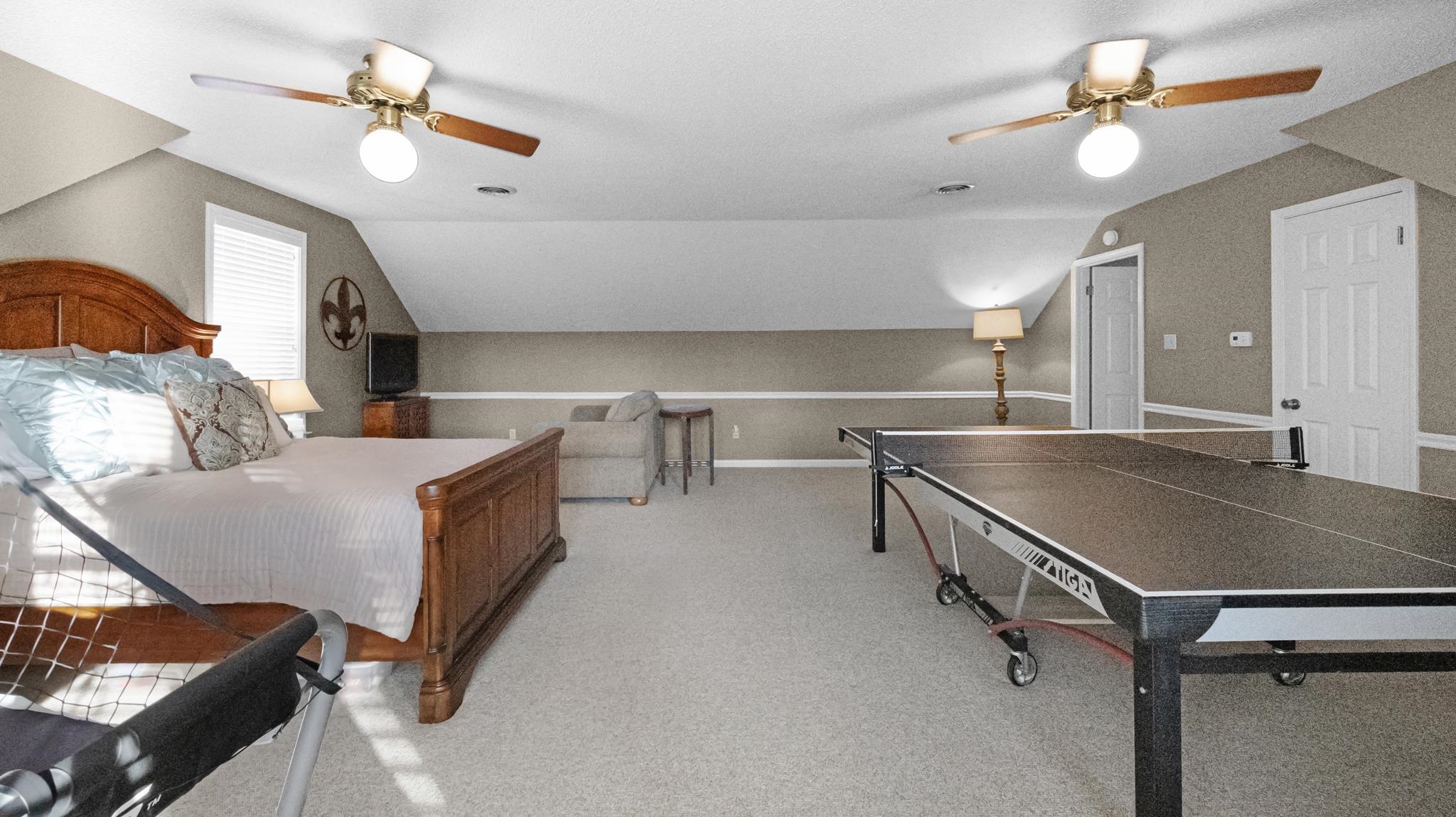 1883 Edwards Mill Road Germantown, TN 38139 - Photo 31 of 40 a living room with furniture and a chandelier