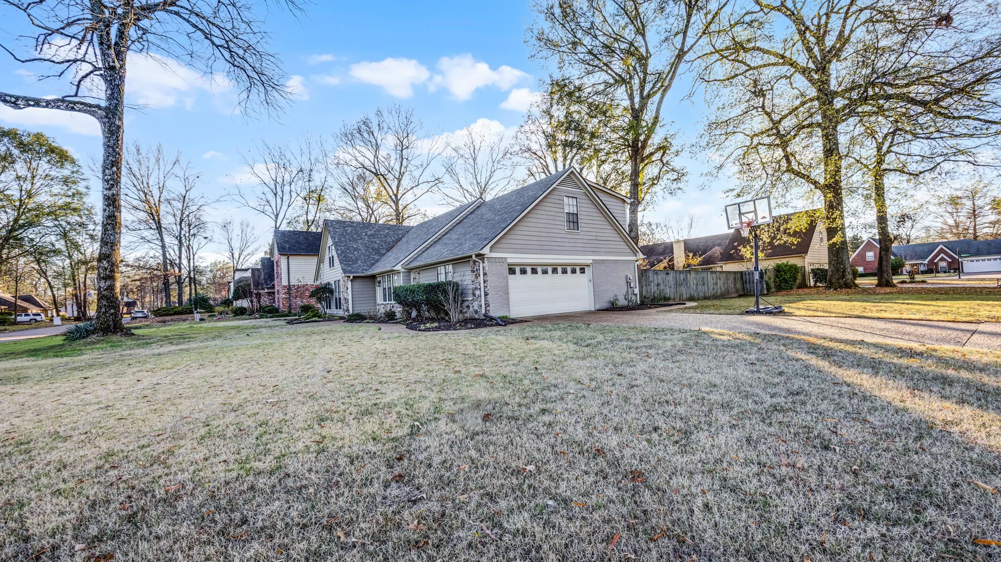 1883 Edwards Mill Road Germantown, TN 38139 - Photo 38 of 40 a house view with a trees in the background