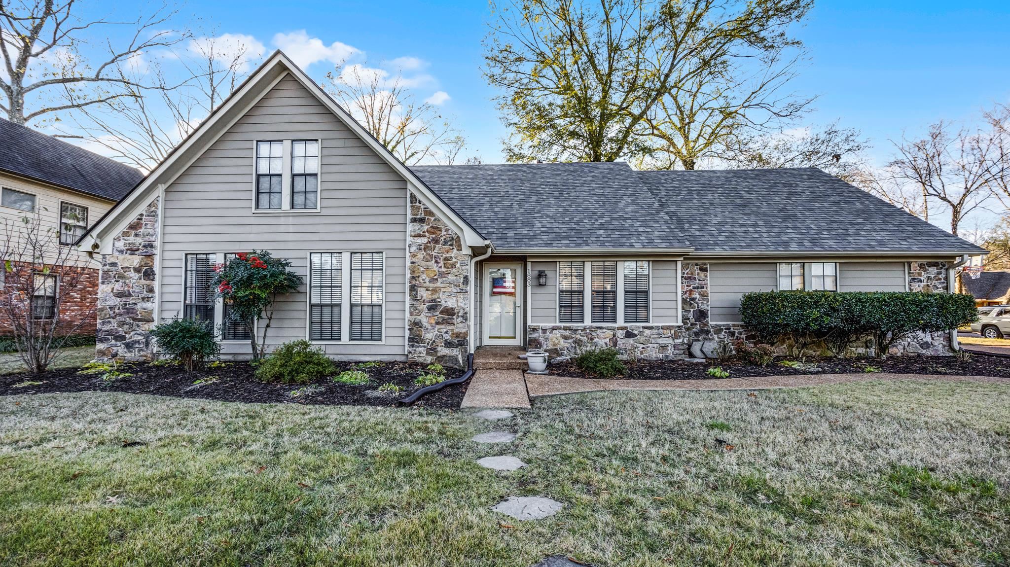 1883 Edwards Mill Road Germantown, TN 38139 - Photo 40 of 40 a view of a house with a yard and plants