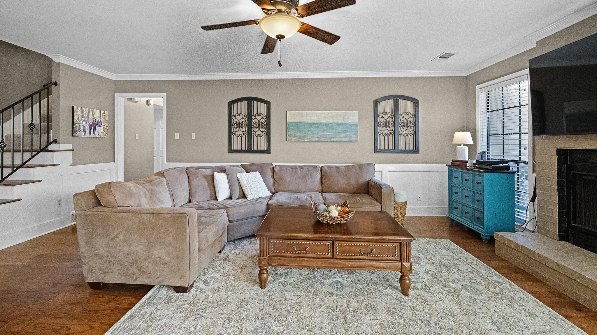 1883 Edwards Mill Road Germantown, TN 38139 - Photo 6 of 40 a living room with furniture and a flat screen tv
