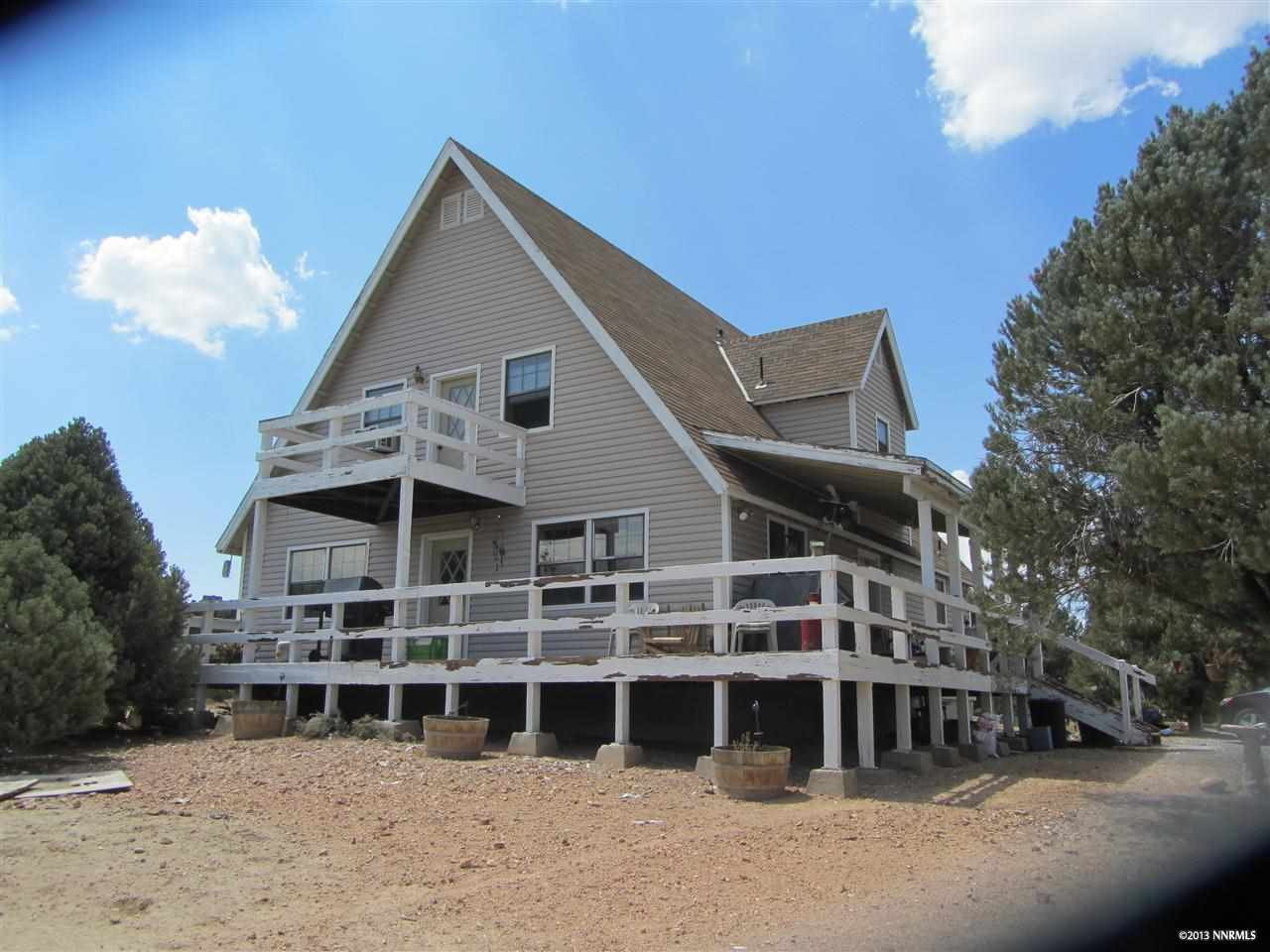 2310 Lousetown Road Reno, NV 89521 - Photo 1 of 1 a front view of a house with a yard